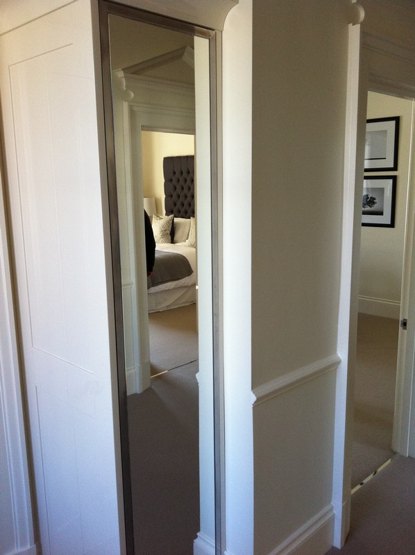 Full-length wardrobe mirror fitted in St John's Wood home