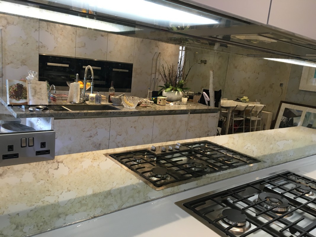 Mirror glass splashback in St John's Wood luxury kitchen